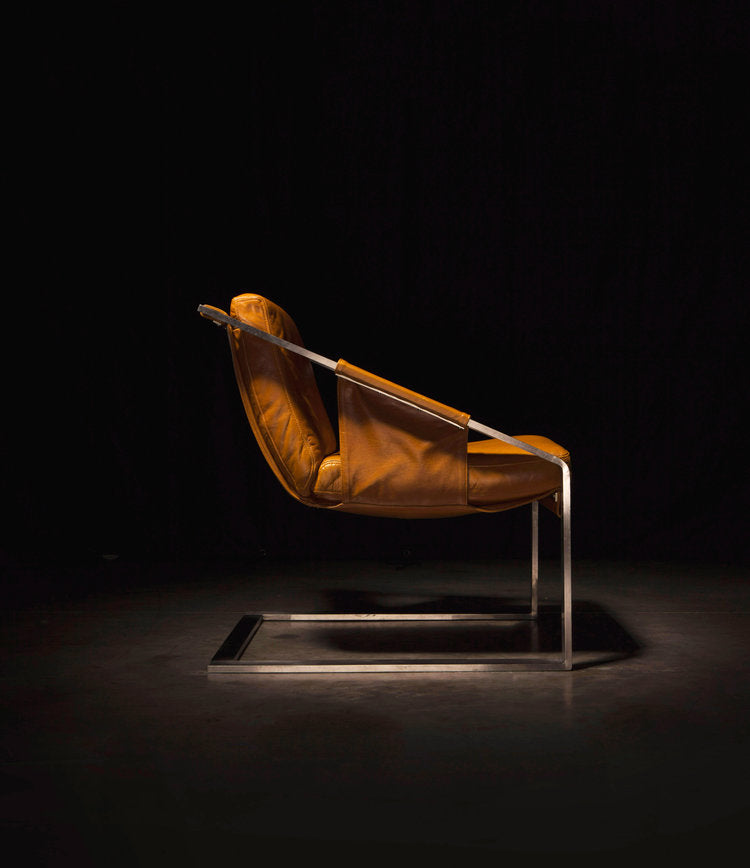 Stylish modern lounge chair with clean lines and comfortable seating, perfect for relaxing in any contemporary living space, Modern Lounge Chairs