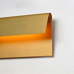 Natural Aged Brass Folded Sconce by Studio M Lighting – lifestyle