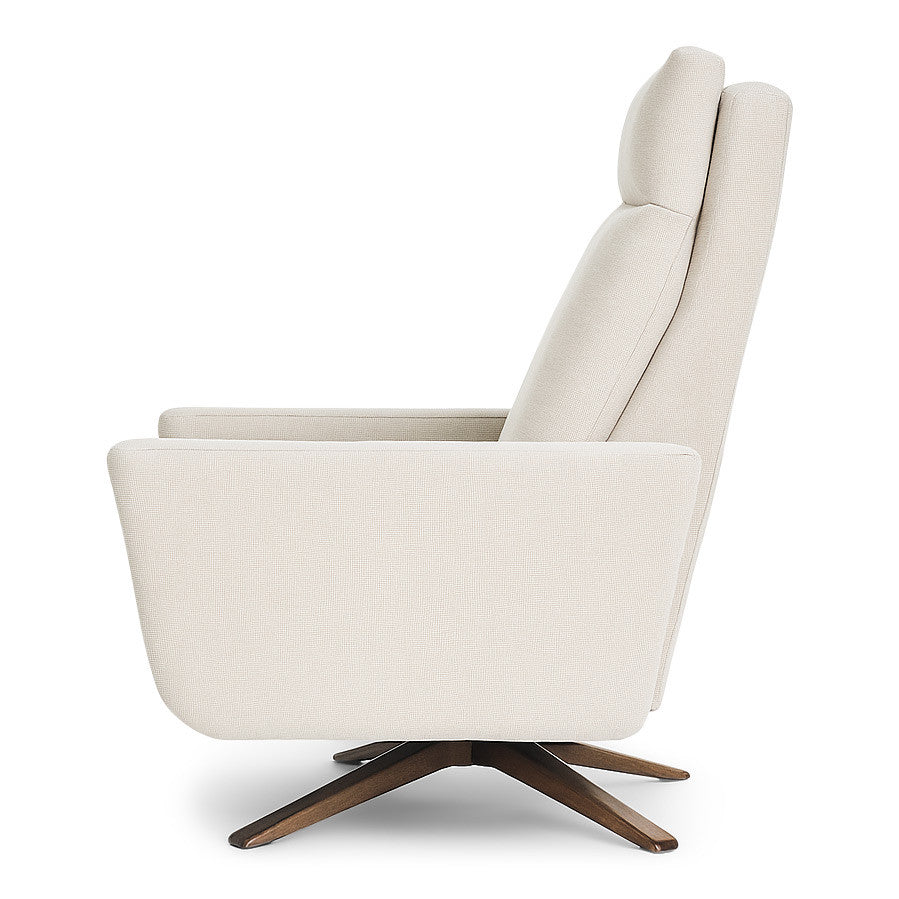 American Leather Cumulus Comfort Solace recliner in cream textured upholstery with walnut-accented four-star base, side studio view on white