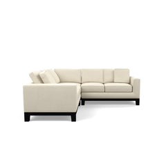 Brooke two-piece corner-return sectional on white; right return when facing the longer seating run.