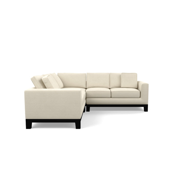 Brooke two-piece corner-return sectional on white; right return when facing the longer seating run.