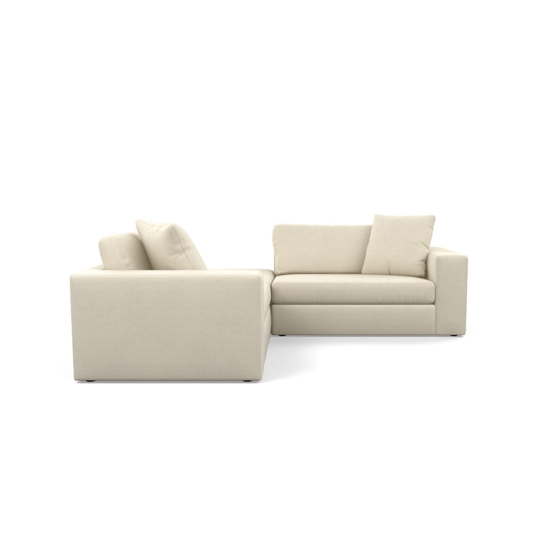 Steve family inspiration: backed corner-return layout, not the included sofa-chaise frames.