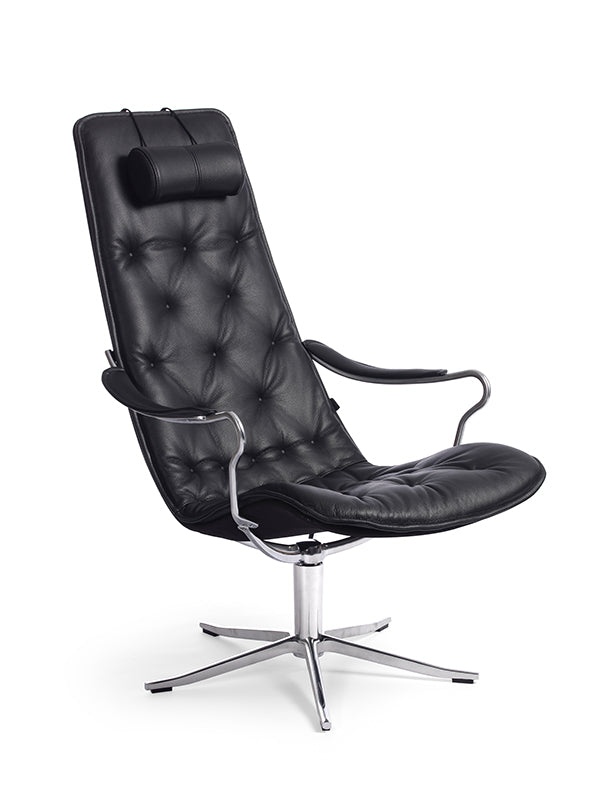 Conform Bravo high-back swivel chair in Fantasy Black upholstery with button tufting, a padded headrest and polished metal base