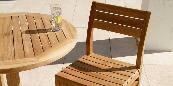 Bermuda Pedestal Table 90 Round by Barlow Tyrie – Bermuda collection lifestyle