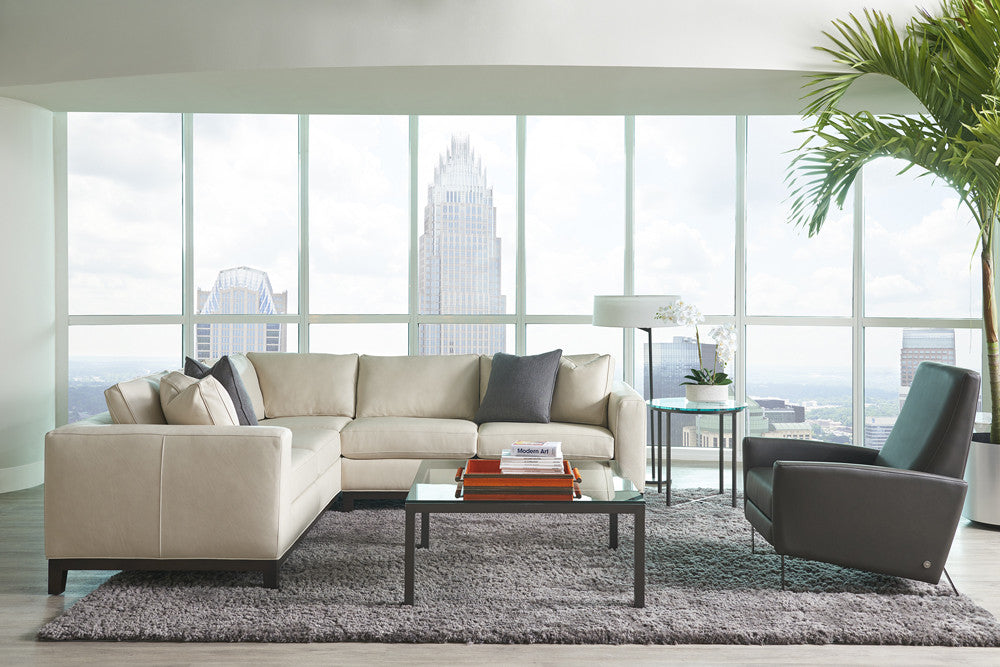 Brooke corner-return sectional room scene; pictured accent chair, tables and accessories are not included.