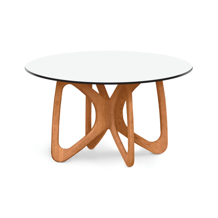 Butterfly Round Glass Top Dining Table in a modern dining room