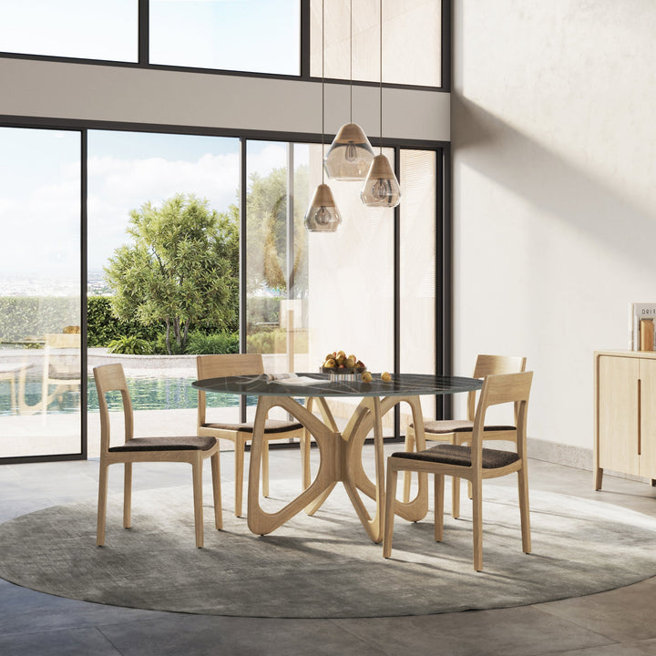 Butterfly Round Sintered Stone Top Dining Table in a modern dining room