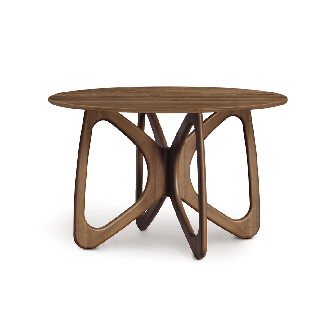 Butterfly Round Fixed Top Dining Table in a modern dining room