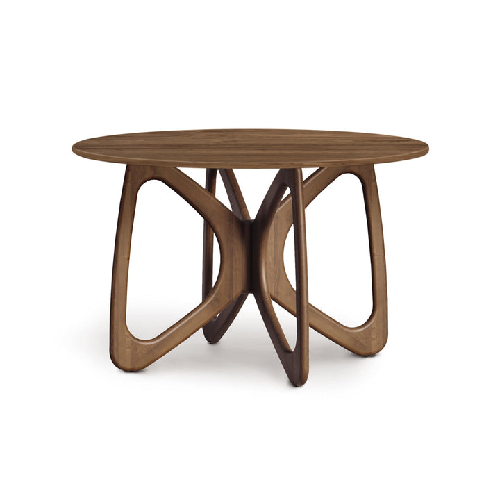 Butterfly Round Fixed Top Dining Table in a modern dining room