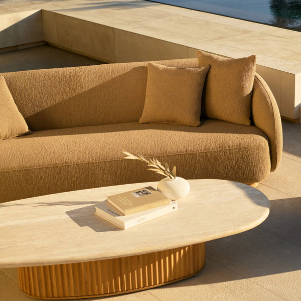 Como sofa and oval coffee table by Harbour Outdoor beside a pool