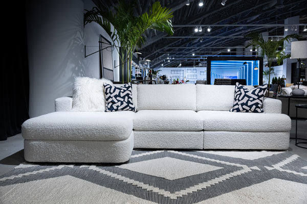 Matteo family lifestyle inspiration — verify curved-sofa configuration; additional pieces are not included