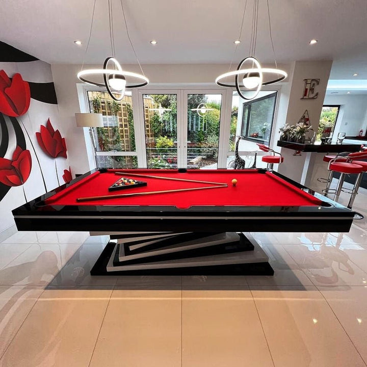 Neavio pool table with red felt under modern chandeliers