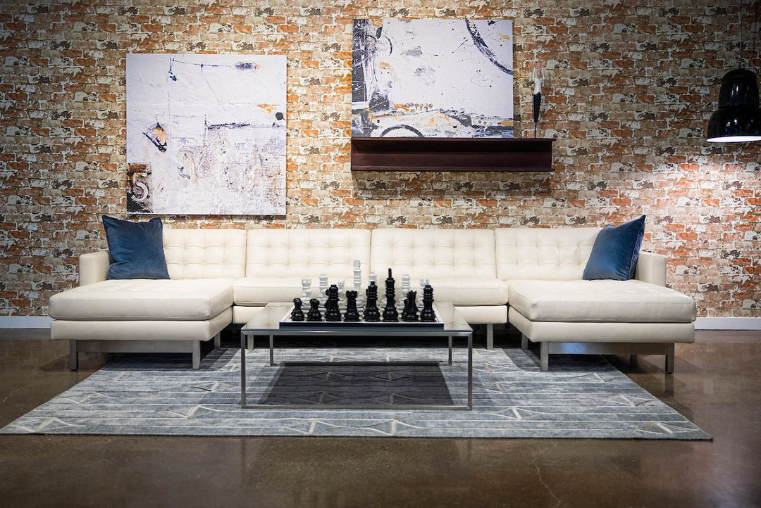 Parker family inspiration: larger double-chaise sectional; extra chaise/frame not included.