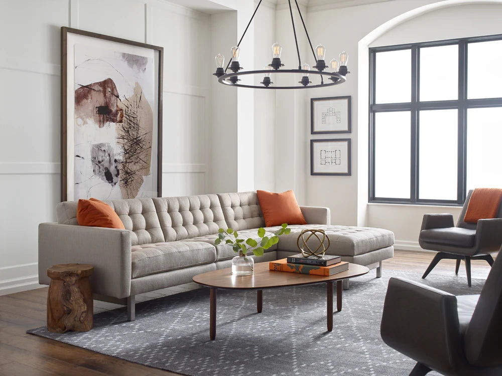 Parker sofa-chaise room scene; pictured tables, chairs and accessories are not included.