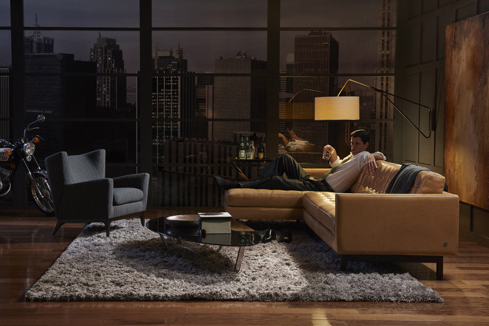Parker sofa-chaise room scene with person; chaise-left mirror, other furniture not included.