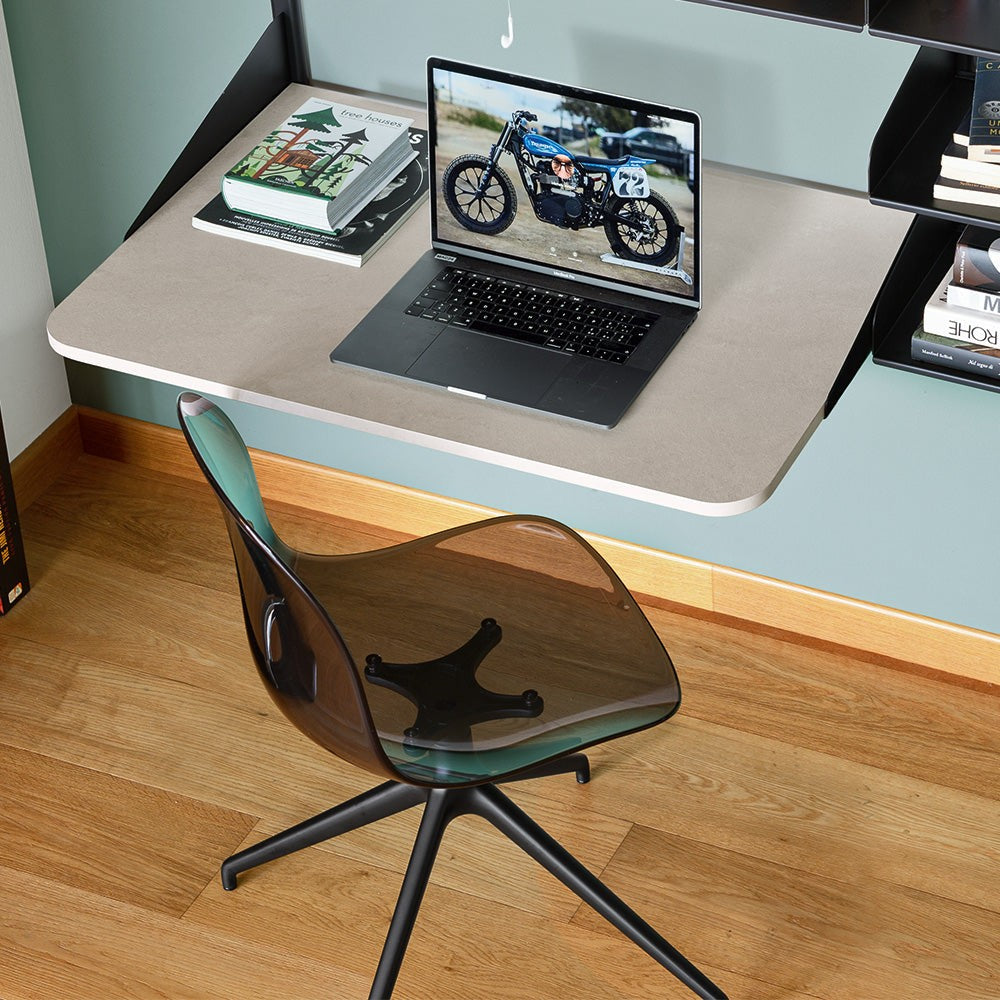 Academy Clear Aluminum Swivel Dining Chair by Connubia in a styled interior