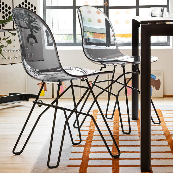 Academy Clear Metal Crossbar Dining Chair by Connubia in a styled interior