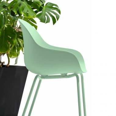 Academy Outdoor Dining Armchair by Connubia in a styled interior