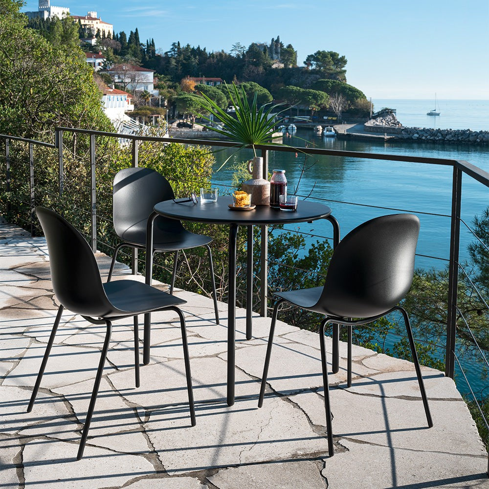 Academy Outdoor Dining Chair by Connubia in a styled interior