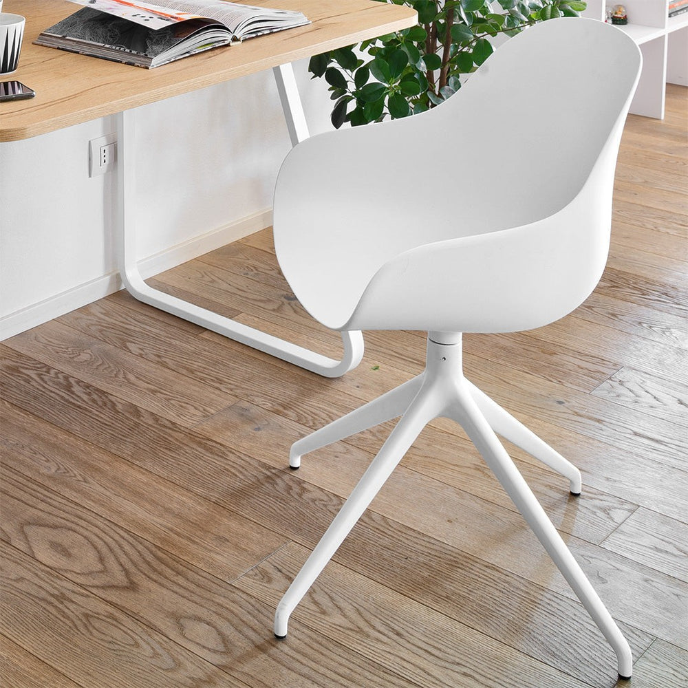 Academy Swivel Dining Armchair by Connubia in a styled interior