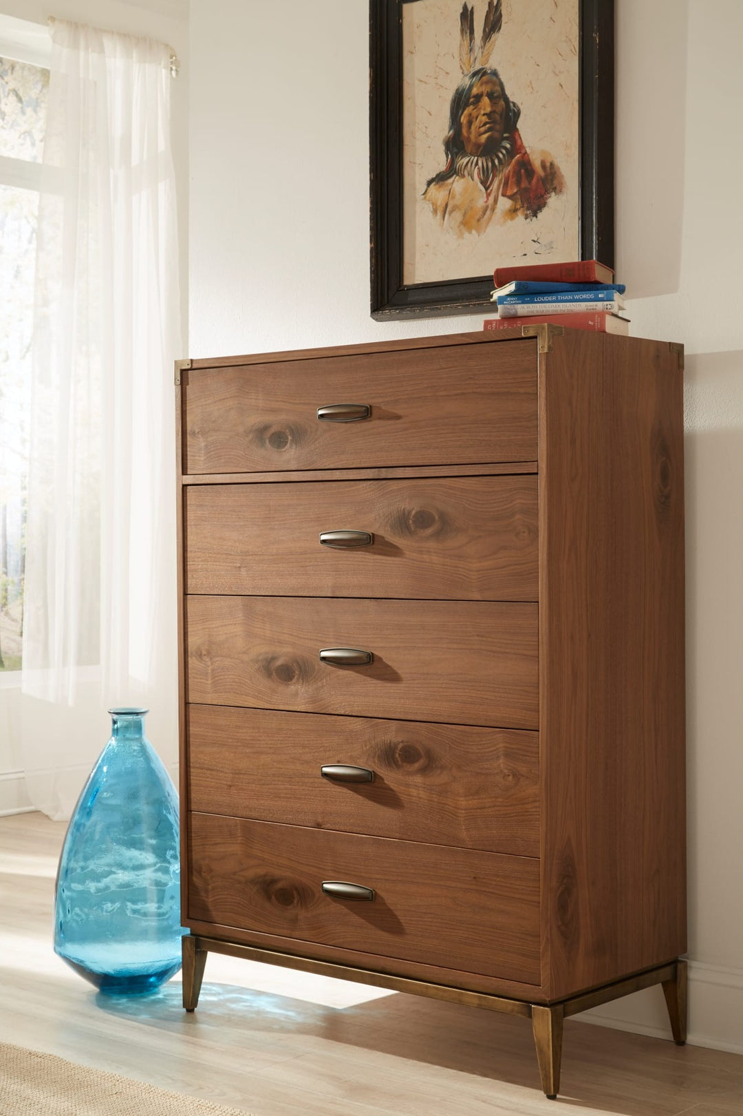 Adler Five Drawer Chest in Natural Walnut — styled in a room