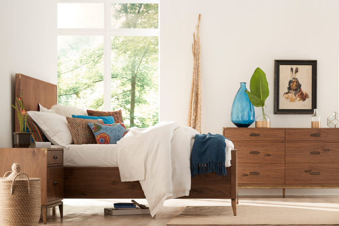 Adler Six Drawer Dresser in Natural Walnut — in a bedroom setting