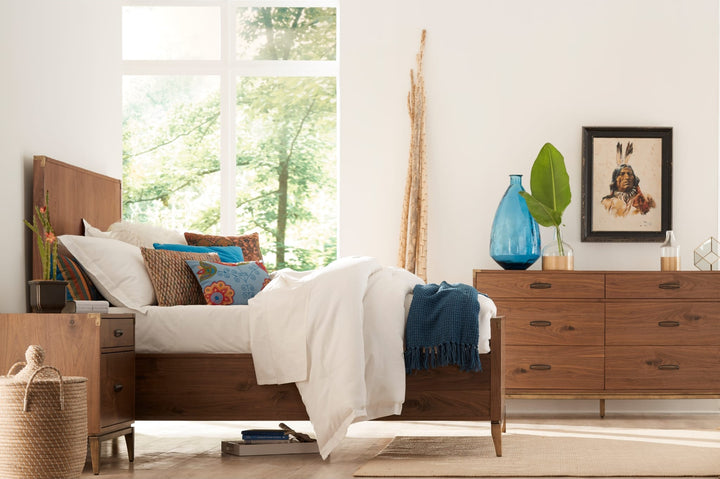 Adler Wood Panel Bed in Natural Walnut styled in a bedroom