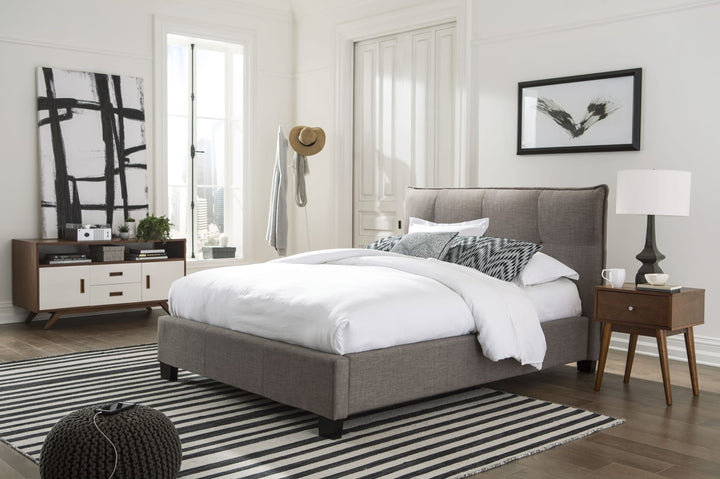 Adona Upholstered Footboard Storage Bed in Dolphin Linen styled in a bedroom