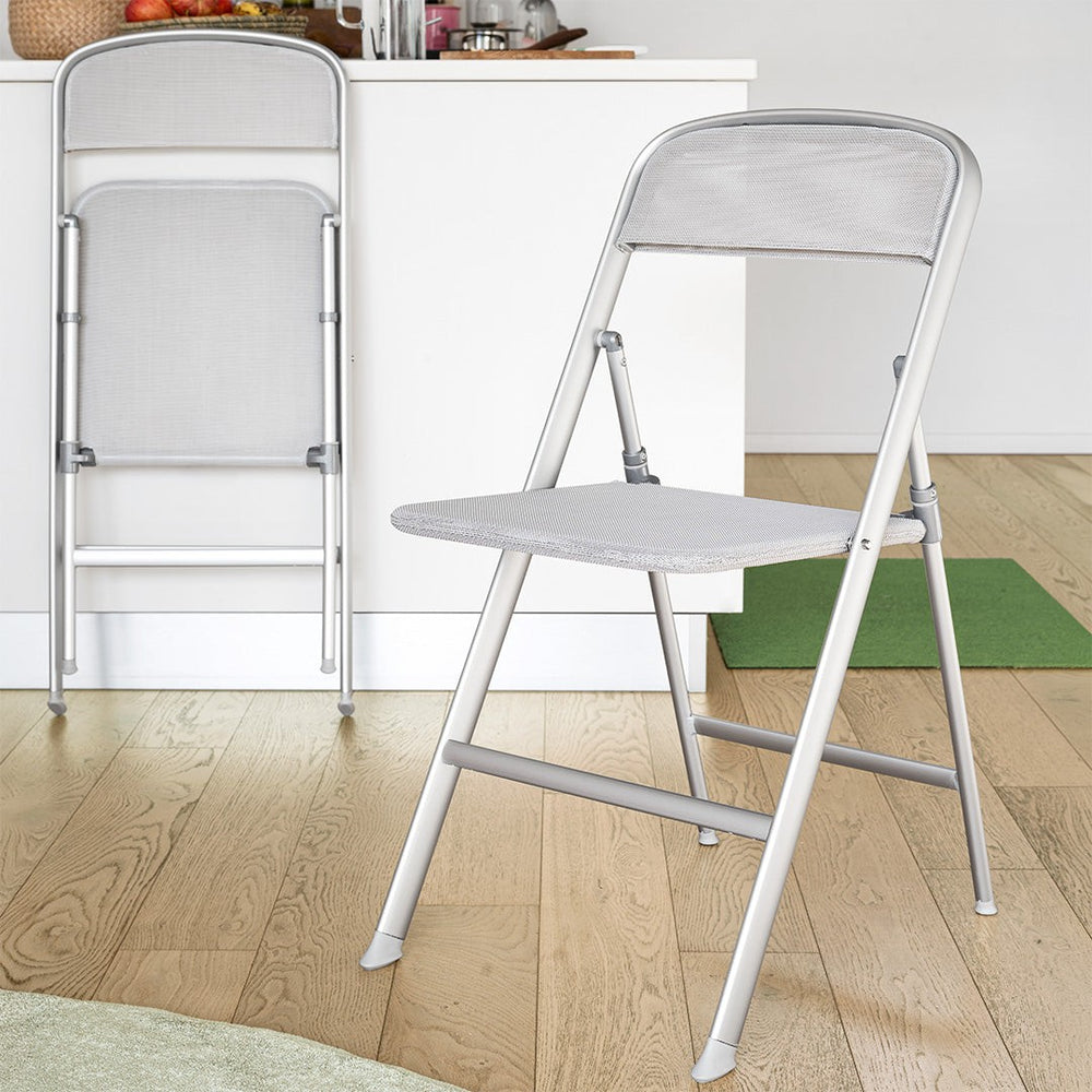 Alu Folding Chair by Connubia in a styled interior