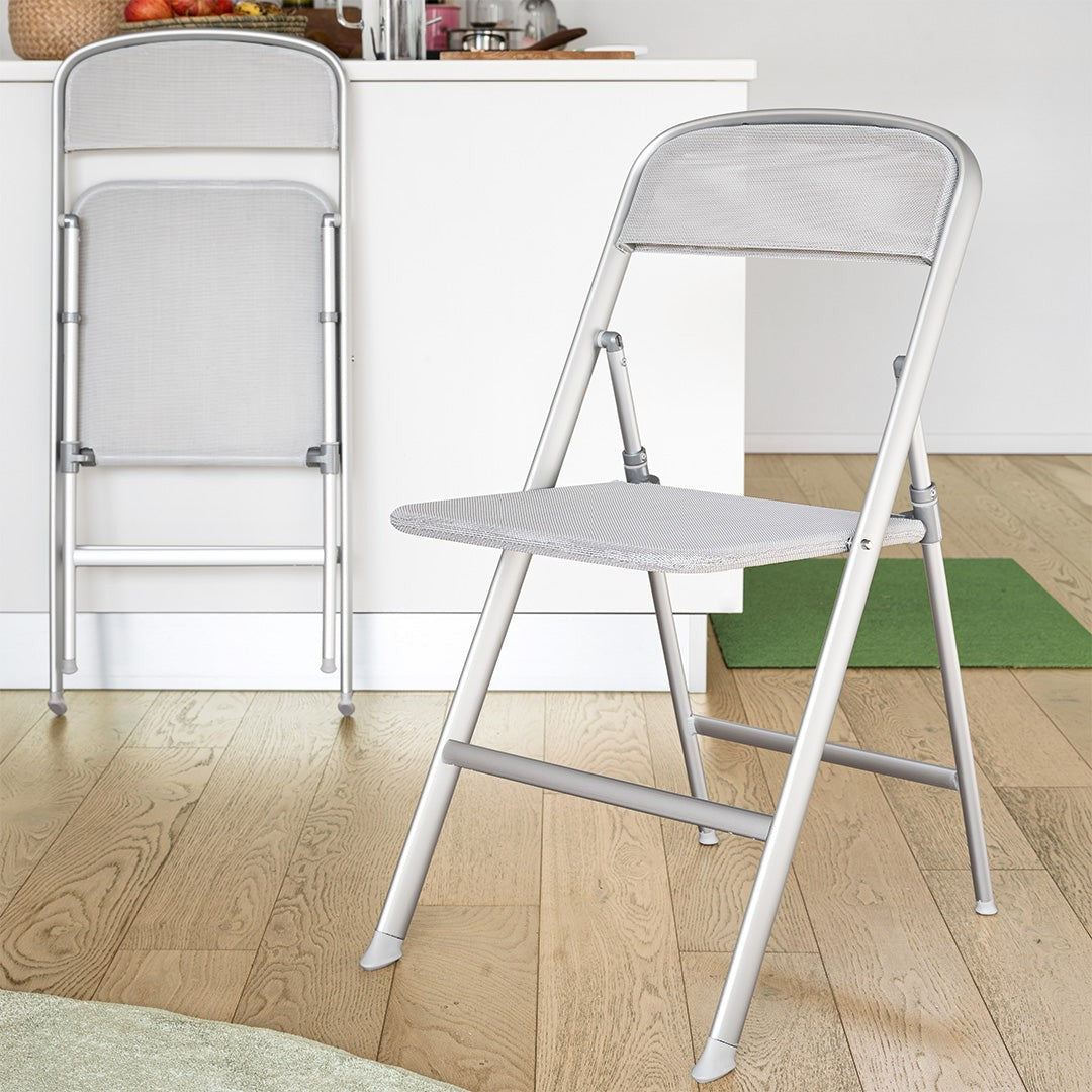 Alu Folding Chair by Connubia in a styled interior