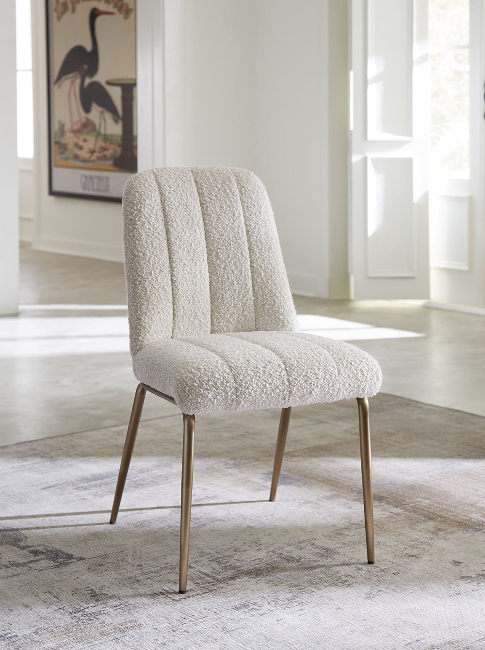 Apollo Upholstered Dining Chair in Ricotta Boucle and Brushed Bronze Metal — lifestyle photo