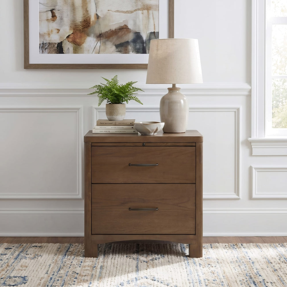 Arden Two Drawer Nightstand in Tavern Brown — styled in a room