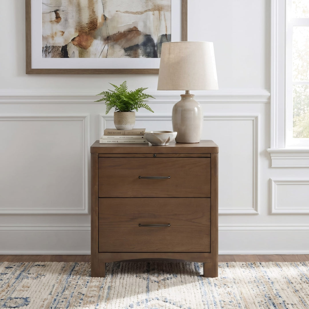 Arden Two Drawer Nightstand in Tavern Brown — styled in a room