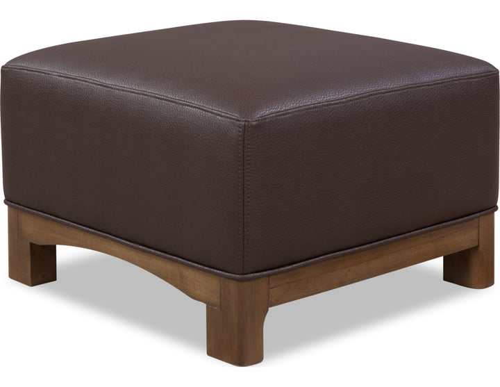 Arden Upholstered Ottoman in Tavern Brown — on a white background