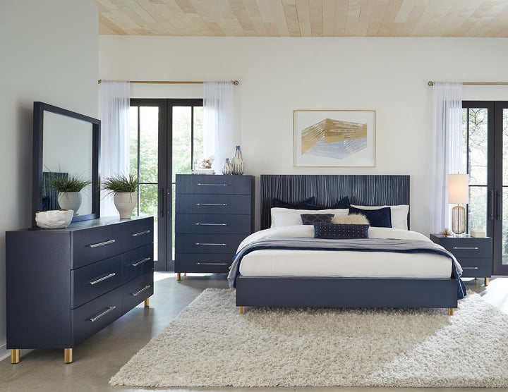 Argento Two Drawer Nightstand in Navy Blue &amp; Burnished Brass — in a bedroom setting