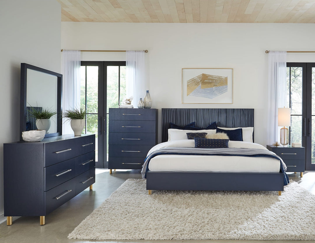 Argento Wall or Dresser Mirror in Navy Blue — in a bedroom setting