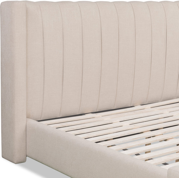Arroyo Upholstered Bed in Cashew — close-up of the channel-tufted headboard
