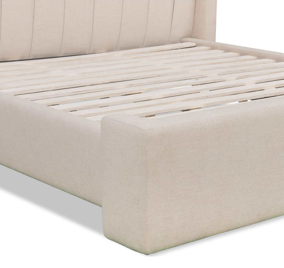 Arroyo Upholstered Bed in Cashew — close-up of the footboard and slats