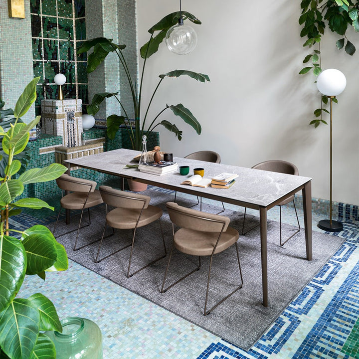 Artic Fast Extendable Dining Table by Connubia in a styled interior