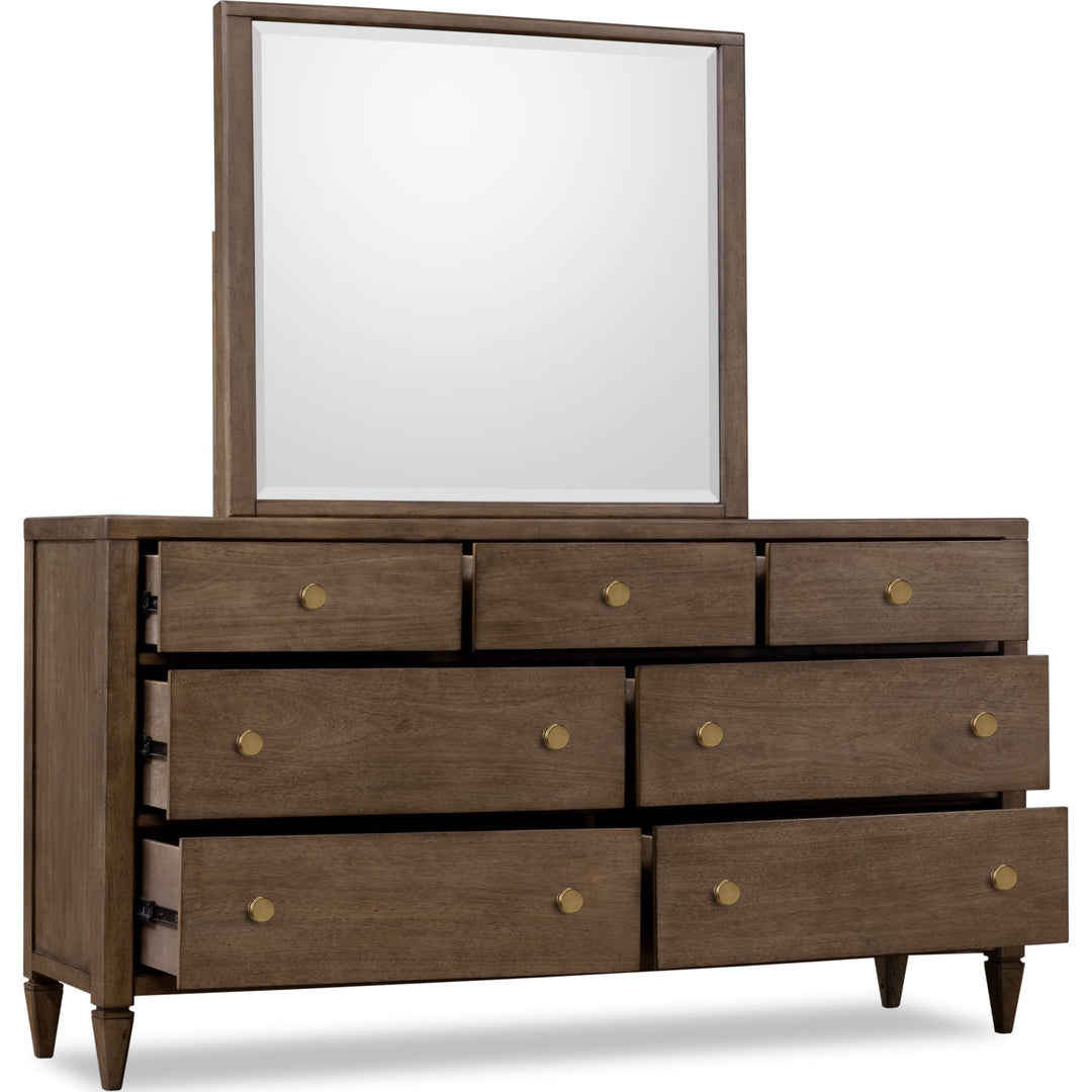 Ascott Seven Drawer Dresser in Pecan Pie — with drawers open, shown with the matching mirror (sold separately)