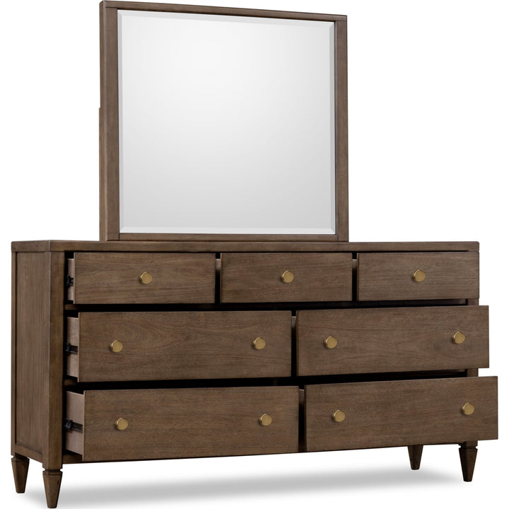 Ascott Seven Drawer Dresser in Pecan Pie — with drawers open, shown with the matching mirror (sold separately)