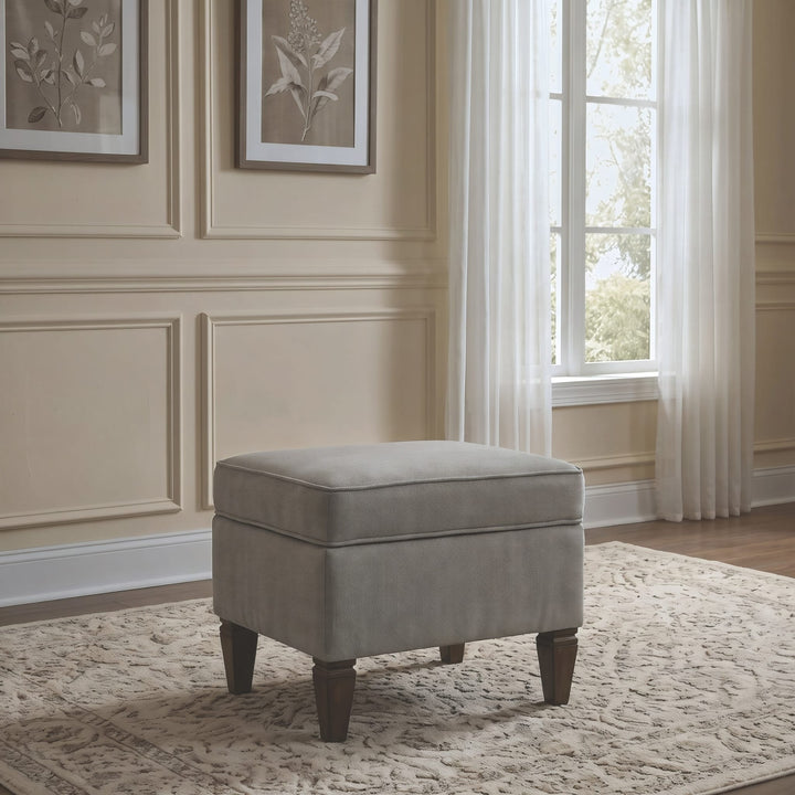Ascott Upholstered Ottoman in Pecan Pie — styled in a room