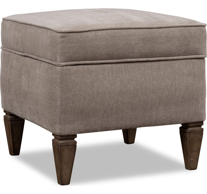 Ascott Upholstered Ottoman in Pecan Pie — on a white background