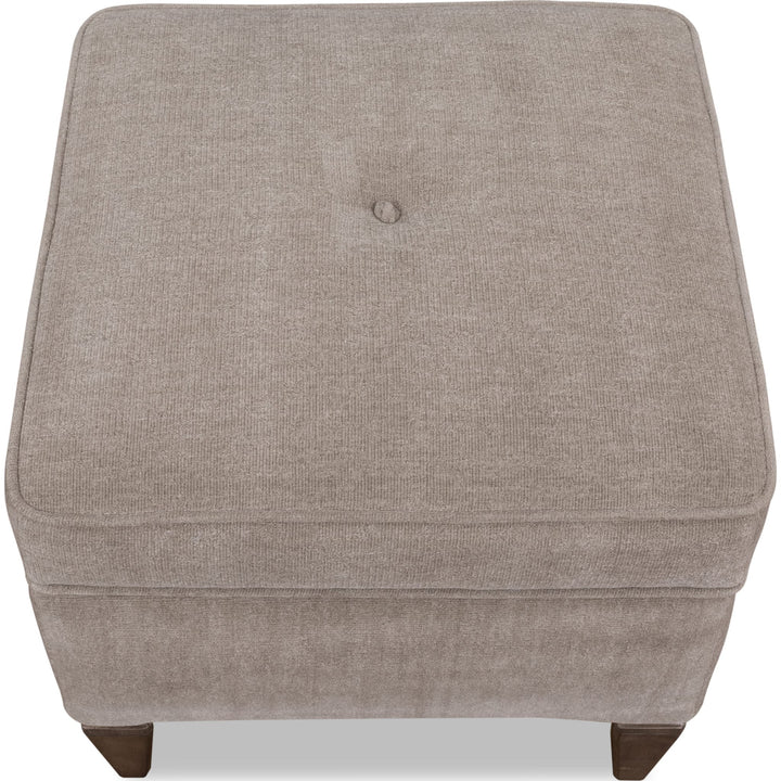 Ascott Upholstered Ottoman in Pecan Pie — on a white background