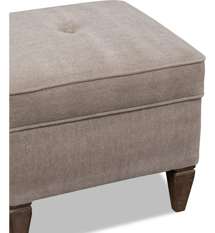 Ascott Upholstered Ottoman in Pecan Pie — on a white background
