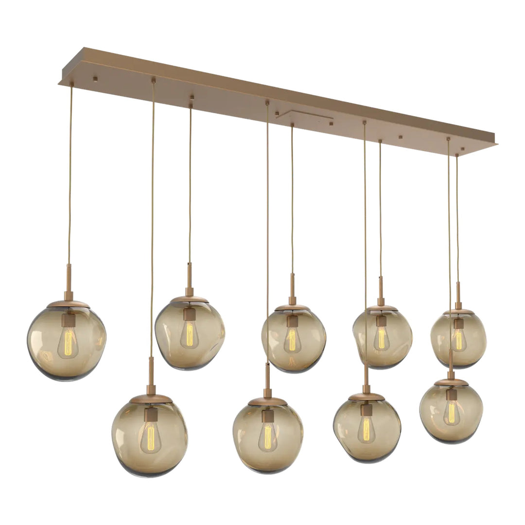 Aster Linear Pendant Chandelier by Hammerton Studio 9 Lights in Novel Brass with Bronze glass (E26)