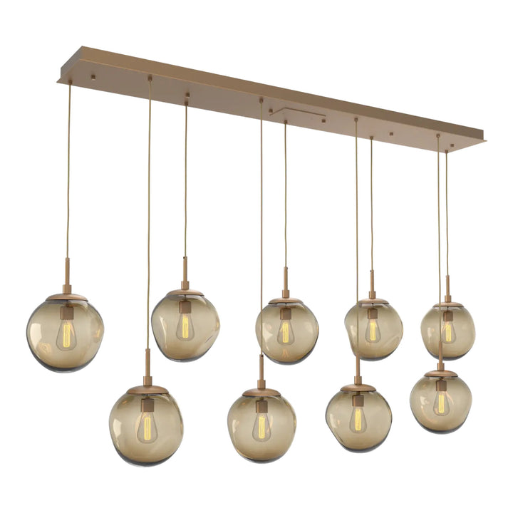 Aster Linear Pendant Chandelier by Hammerton Studio 9 Lights in Novel Brass with Bronze glass (E26)