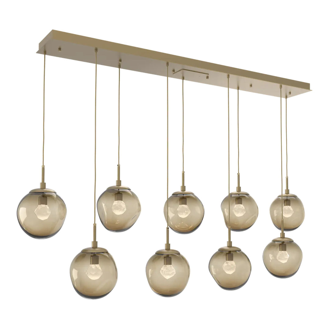 Aster Linear Pendant Chandelier by Hammerton Studio 9 Lights in Gilded Brass with Bronze glass (LED)