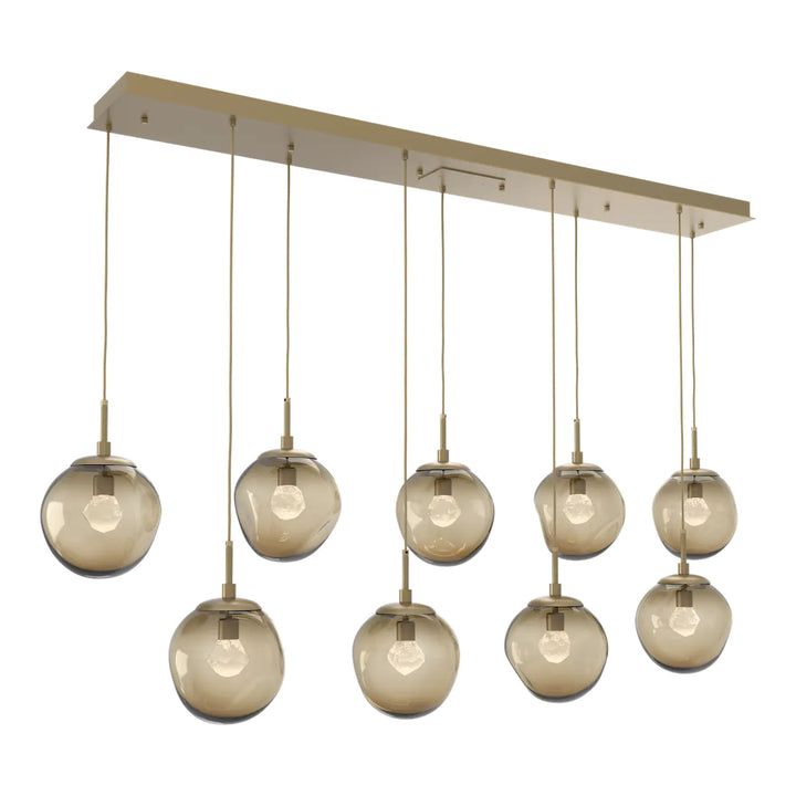 Aster Linear Pendant Chandelier by Hammerton Studio 9 Lights in Gilded Brass with Bronze glass (LED)