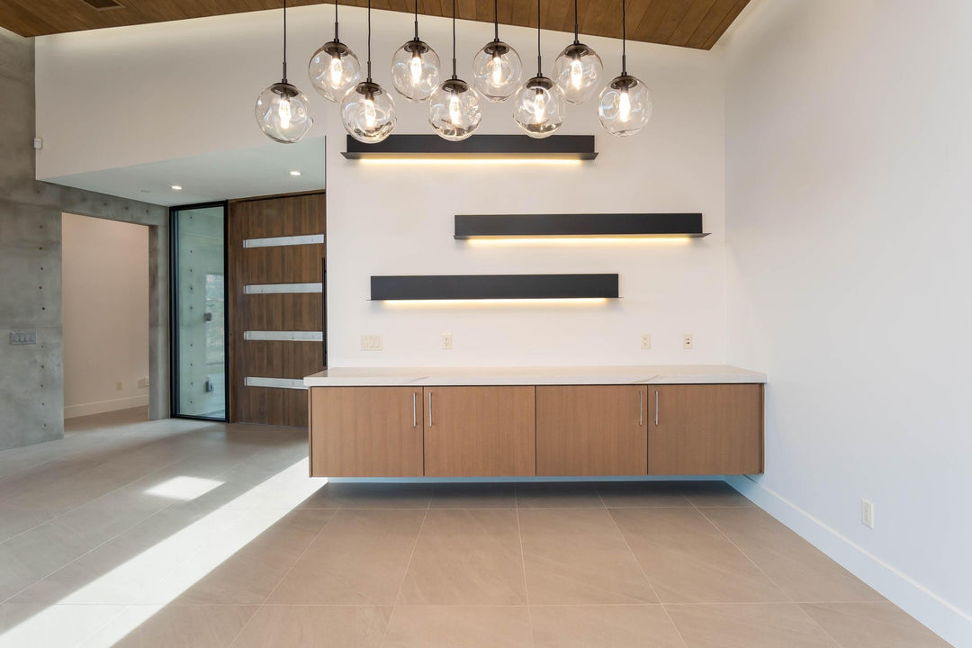 Aster Linear Pendant Chandelier by Hammerton Studio in a styled interior